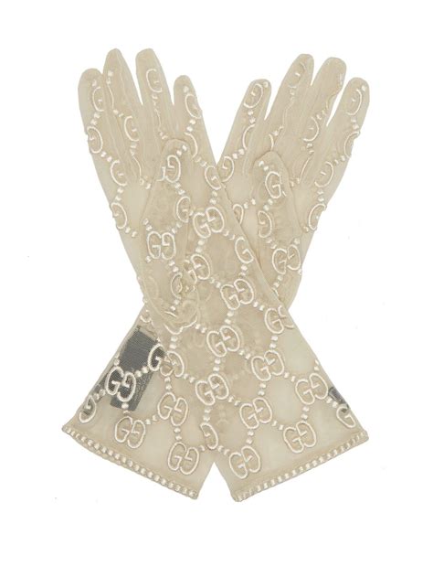 white gucci gloves
